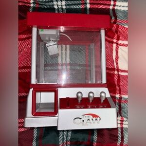 Vintage Red and Silver The Claw Machine